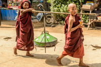 Young Monks Collecting Food